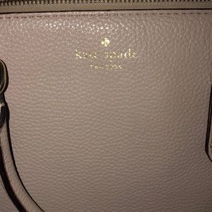 Kate spade tote and it can be a cross body